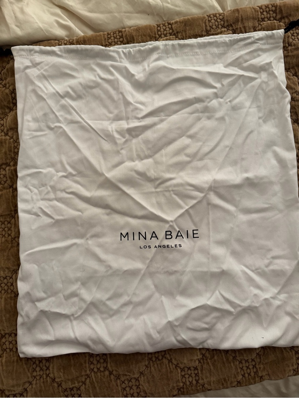 Mina Baie Los Angeles White Dust Bag